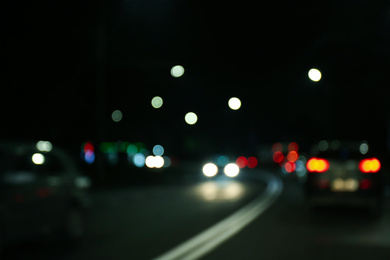 Blurred view of city at night. Bokeh effect