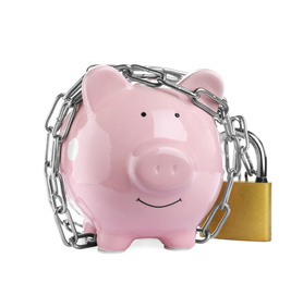 Piggy bank with steel chain and padlock isolated on white. Money safety concept