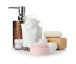 Different body care products on white background