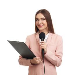 Young female journalist with microphone and clipboard on white background