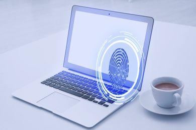 Fingerprint identification. Modern laptop and cup of coffee on table indoors