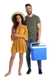 Happy couple with cool box and bottle of beer on white background