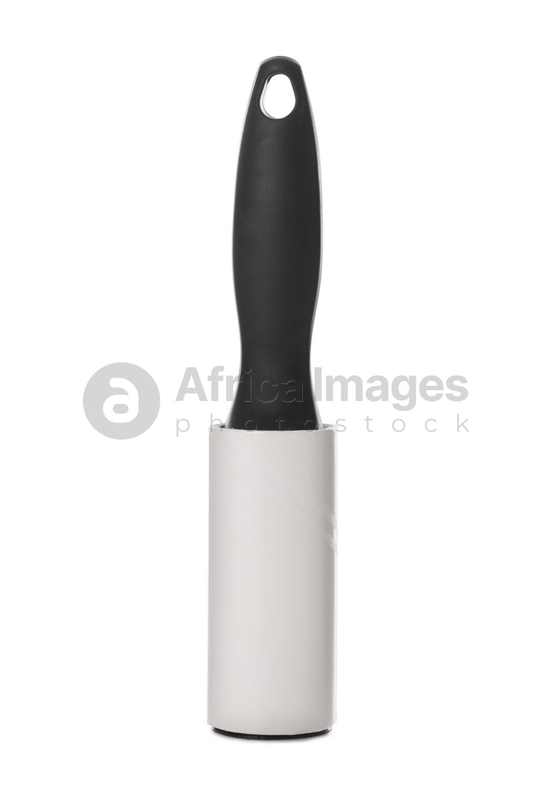 Photo of New lint roller with black handle isolated on white