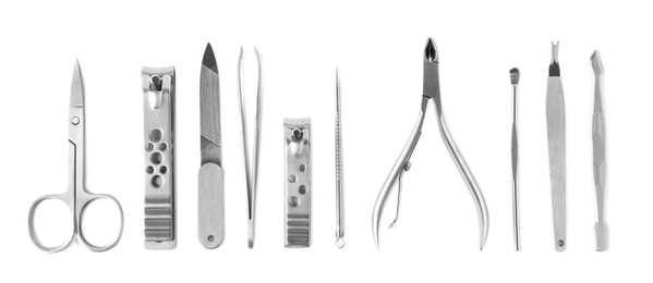 Manicure set on white background, top view