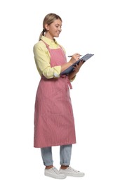 Beautiful young woman in clean striped apron with clipboard on white background