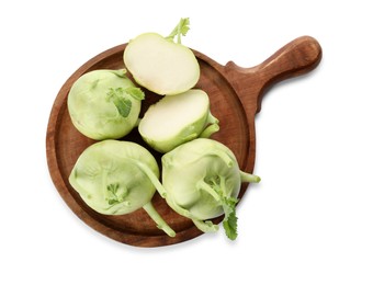 Whole and cut kohlrabi plants on white background, top view