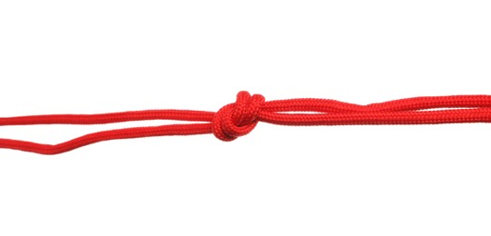 Red shoe laces tied in knot isolated on white