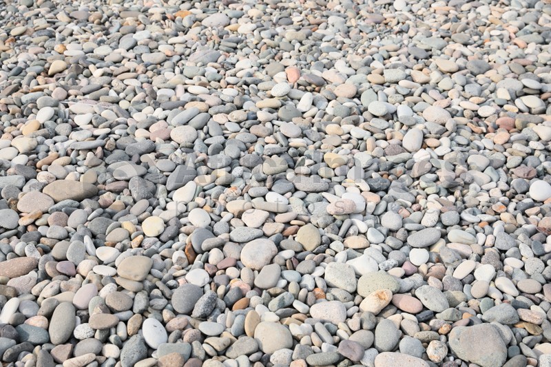 Pile of pebbles on shingle beach as background
