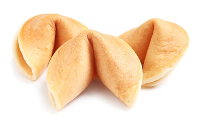 Tasty traditional fortune cookies on white background