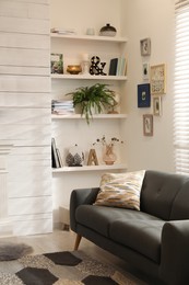 Cozy living room interior with comfortable sofa near window