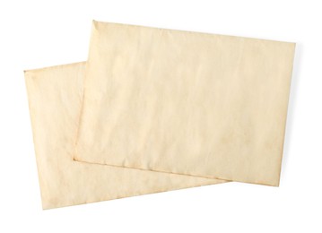 Old letters on white background, top view