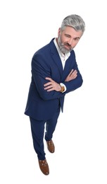 Photo of Mature businessman in stylish clothes posing on white background, above view