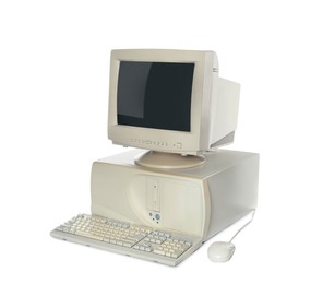 Old computer monitor, keyboard, system unit and mouse on white background