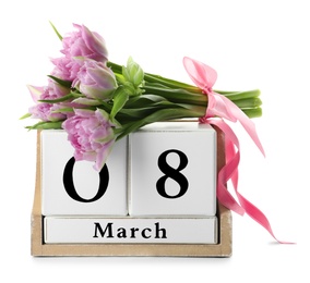 Wooden block calendar with date 8th of March and tulips on white background. International Women's Day