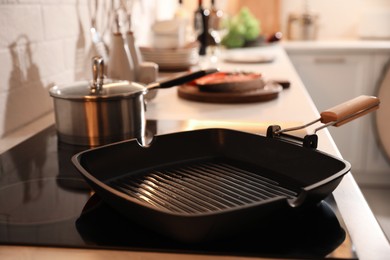 Frying pan with cooking oil on cooktop