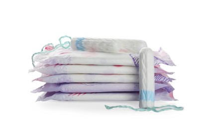 Menstrual pads and tampons on white background. Gynecological care