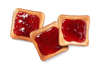 Photo of Delicious crispy toasts with berry jam on white background, top view