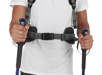 Man with backpack and trekking poles on white background, closeup