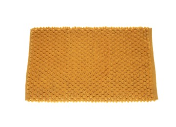 Soft orange bath mat isolated on white, top view