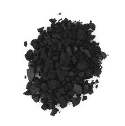 Pile of crushed activated charcoal pills on white background, top view. Potent sorbent