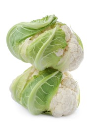 Photo of Whole fresh raw cauliflowers isolated on white