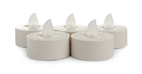 Decorative flameless LED candles on white background
