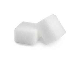 Two cubes of refined sugar isolated on white