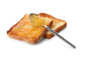 Delicious toasts and one with orange marmalade on white background