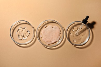 Photo of Flat lay composition with Petri dishes on beige background