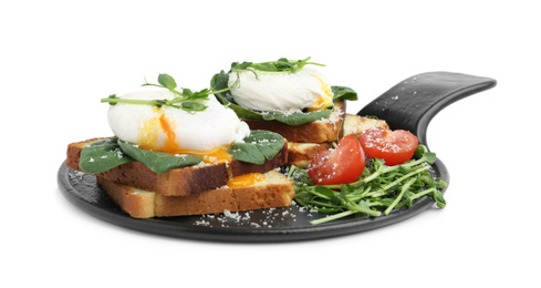 Delicious poached egg sandwiches with garnish isolated on white
