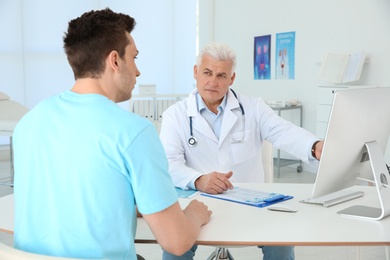 Man with health problems visiting urologist at hospital