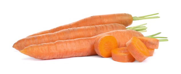 Tasty ripe organic carrots on white background