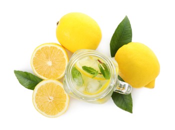 Cool freshly made lemonade and ingredients on white background, top view