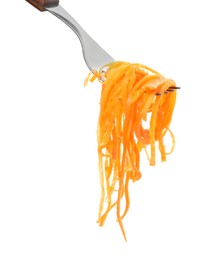 Fork with delicious Korean carrot salad on white background
