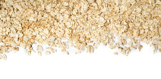 Raw oatmeal on white background, top view