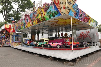 Photo of DARLOWO, POLAND - AUGUST 22, 2022: Kids attractions in amusement park