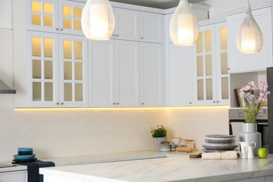 Modern kitchen interior with stylish white furniture