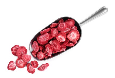 Photo of Scoop with freeze dried strawberries on white background, top view