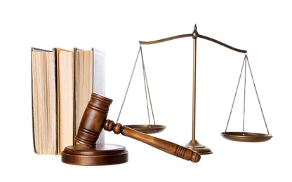 Wooden gavel, books and scales of justice on white background