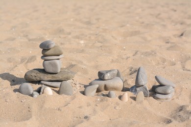 Different stones on sandy beach. Zen concept