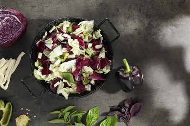 Delicious salad with Chinese cabbage, suluguni cheese and bell pepper on grey table, flat lay