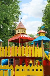 New colorful castle playhouse on children's playground