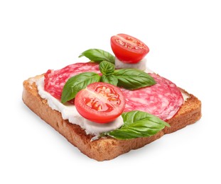 Photo of Tasty toast with cream cheese, tomato, salami and basil on white background