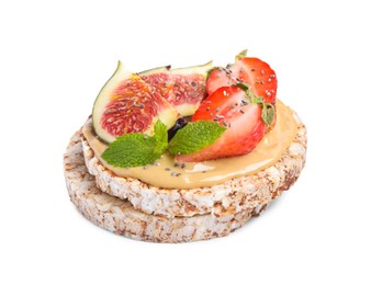 Tasty crispbreads with peanut butter, figs, mint and strawberry on white background