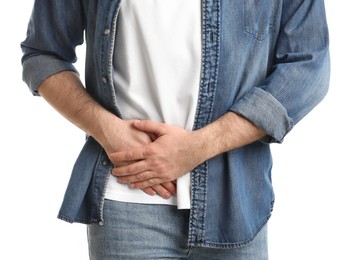 Man suffering from acute appendicitis on white background, closeup