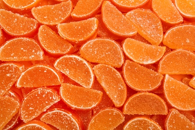 Sweet orange marmalade as background, top view