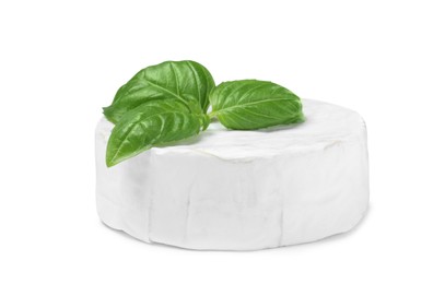 Tasty brie cheese with basil isolated on white