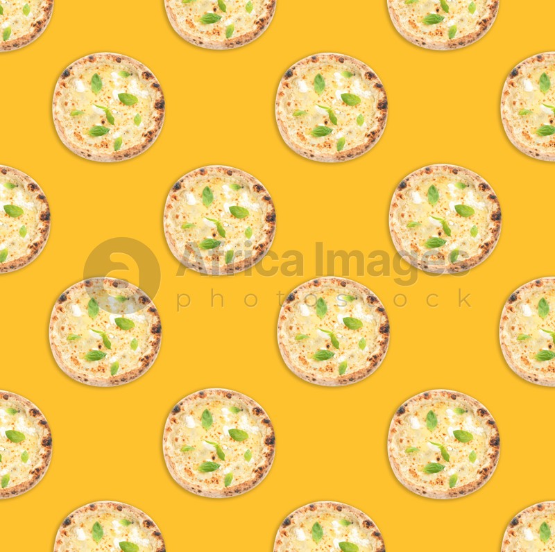 Many delicious cheese pizzas on yellow background, flat lay. Seamless pattern design