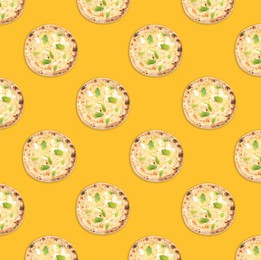 Many delicious cheese pizzas on yellow background, flat lay. Seamless pattern design