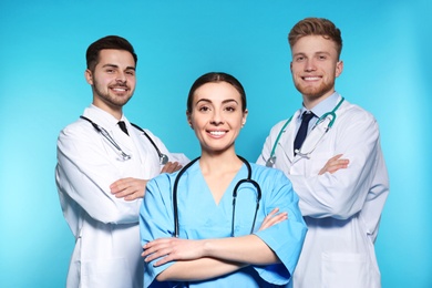 Group of medical doctors on color background. Unity concept